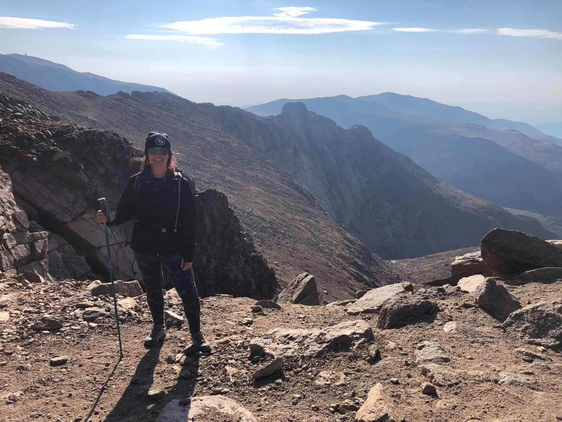 Stacey hiking near the summit of Mount Bierstadt