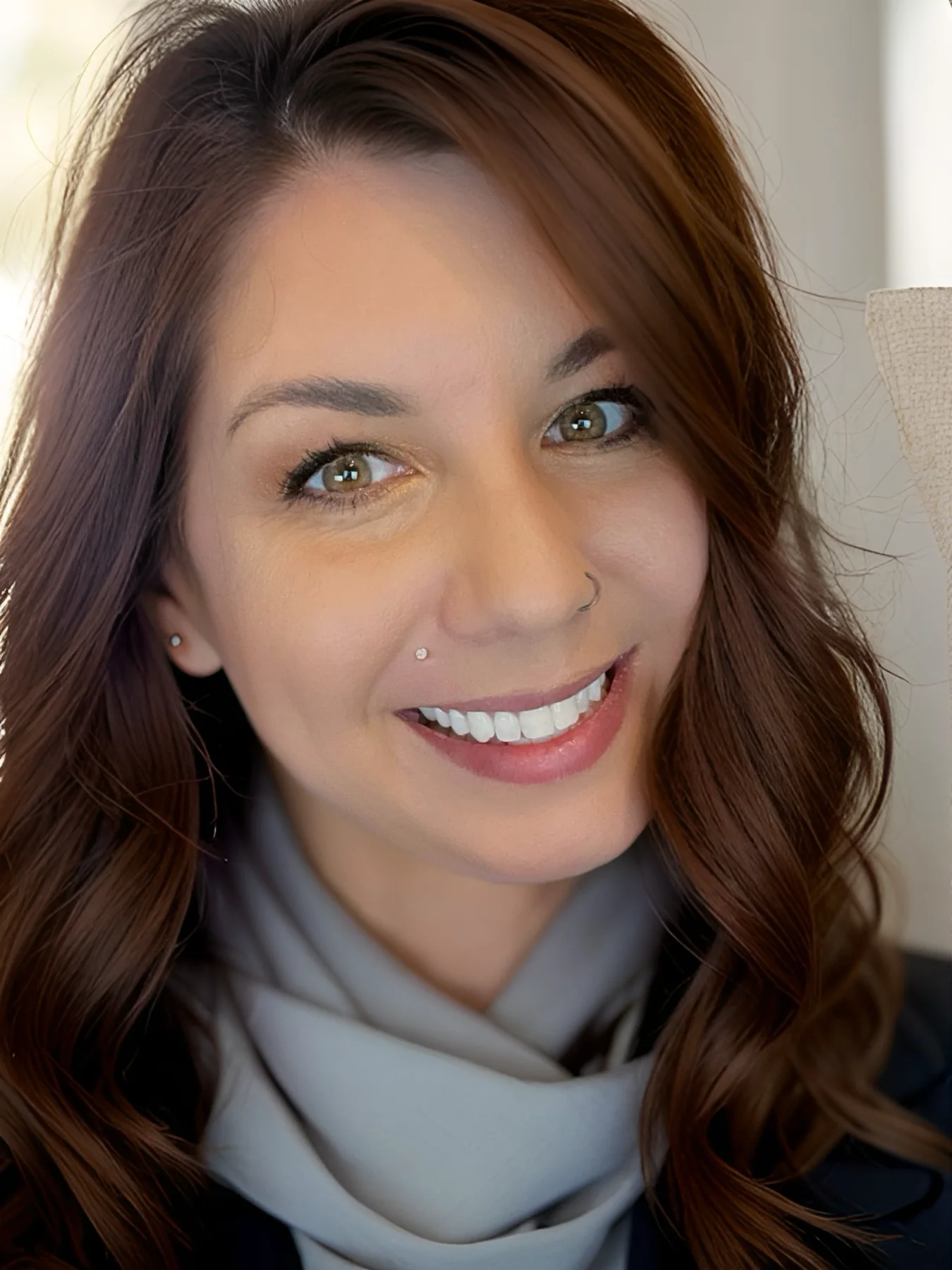 Professional portrait of Stacey Queen smiling